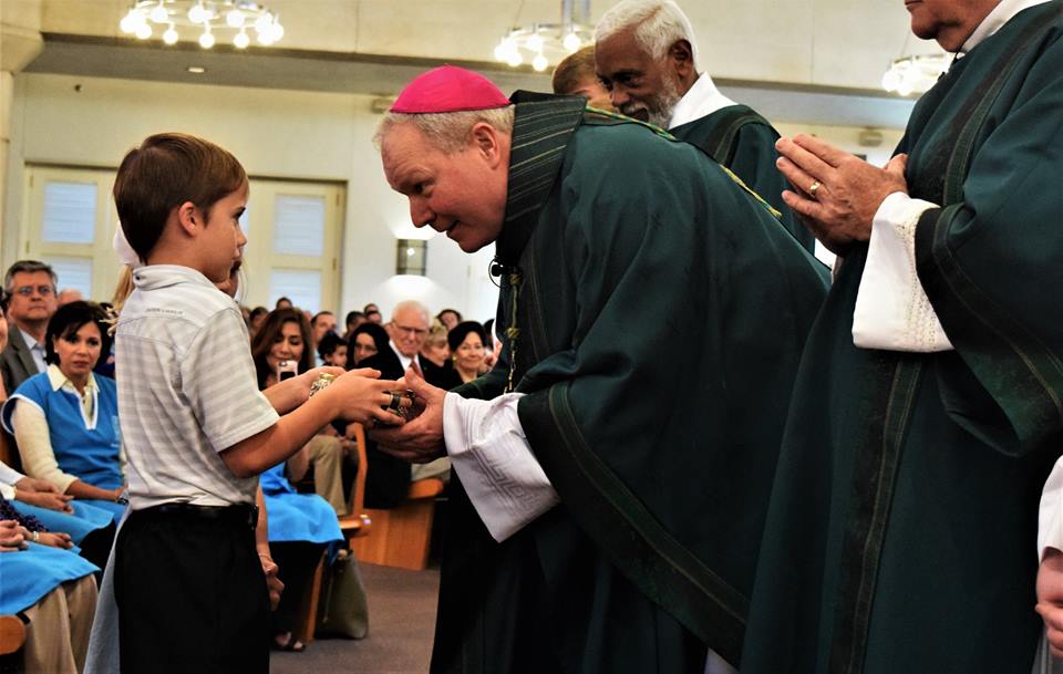 Bishop Burns receives gifts at 2017 Respect Life Mass