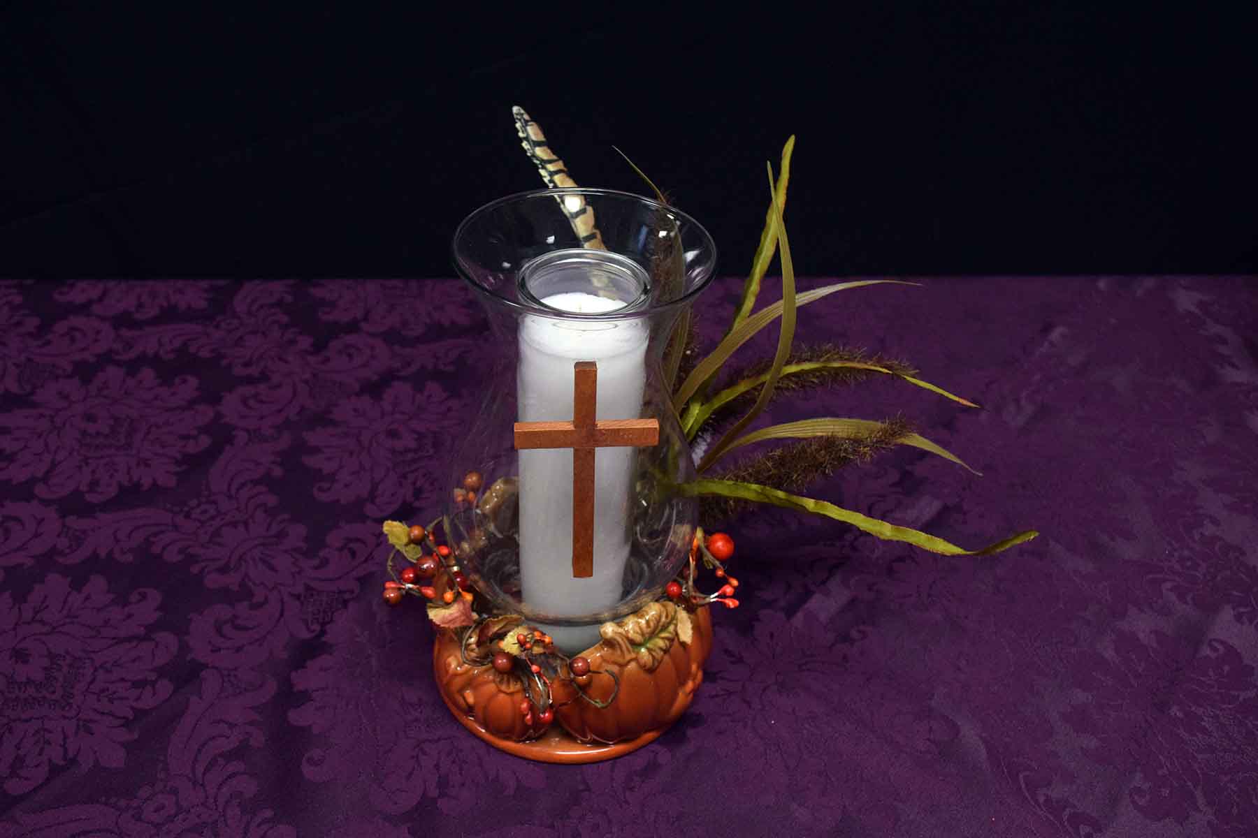 T_2_--_Wooden_Cross_on_white_candle_and_pumpkins.jpg